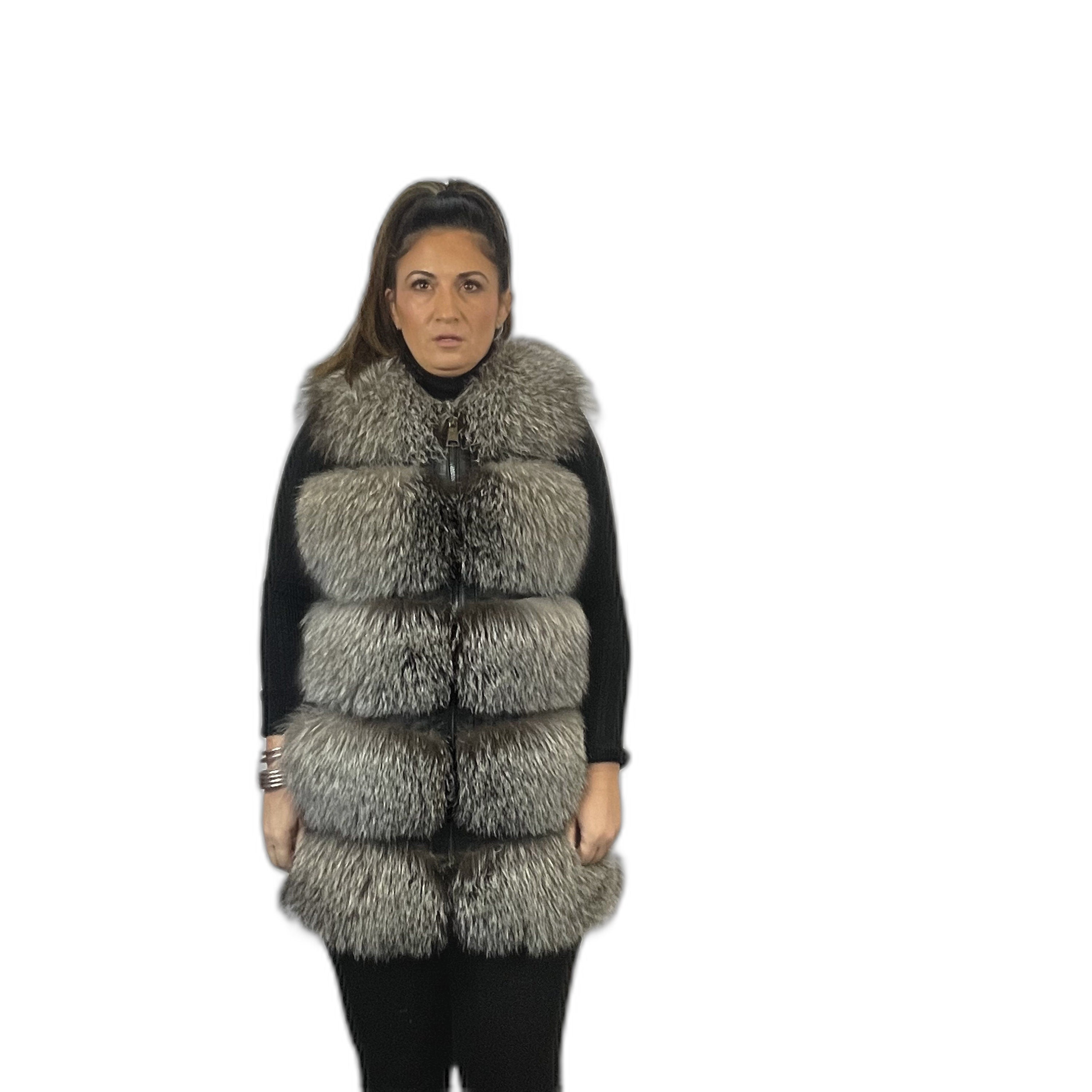 Beautiful fox fur vest. Leather vest with studs